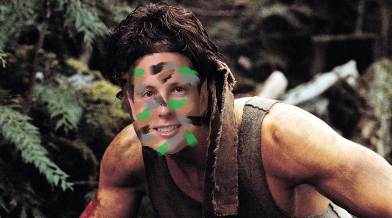 Austin as Rambo with Camo face eat what you kill depiction